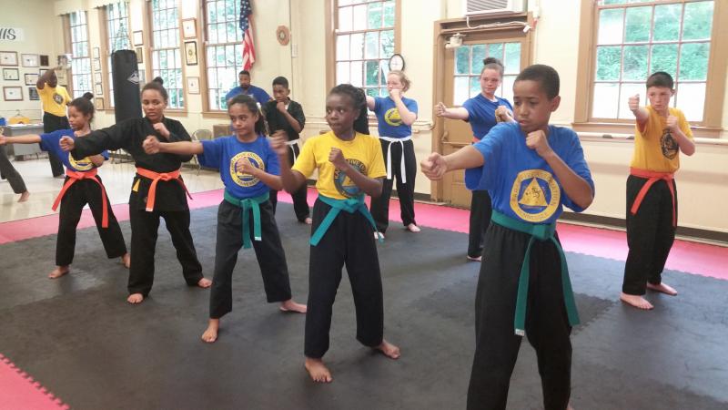 Young Karate Five students in training